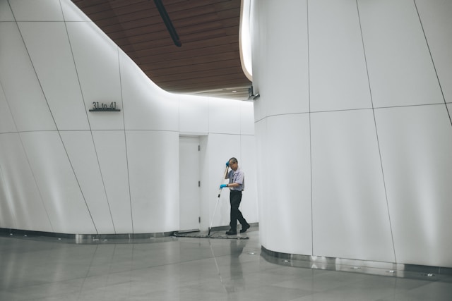 Mopping a modern building lobby