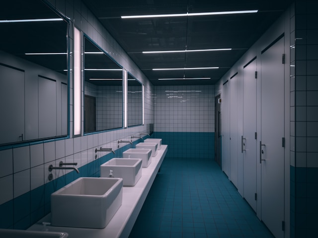 Sanitary washroom with bright tiles